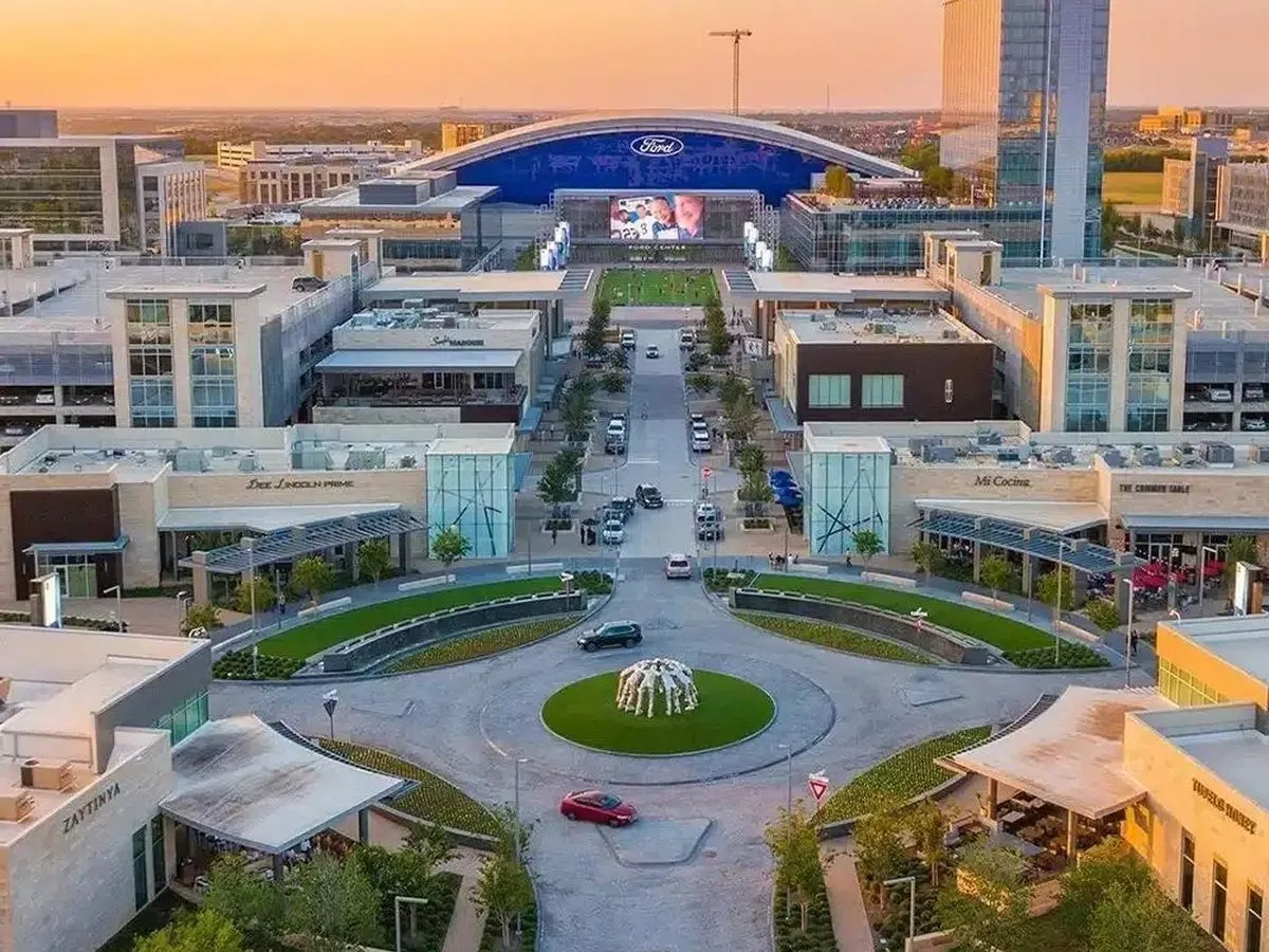 Aerial view of a Frisco, Texas neighborhood at golden hour