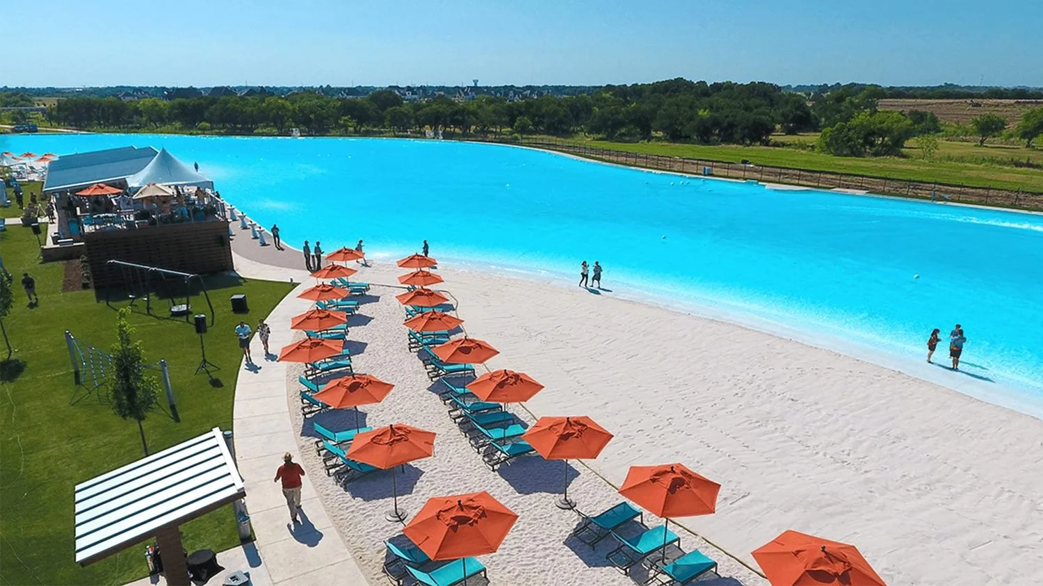 Aerial view of the Crystal Lagoon and beach club at Windsong Ranch in Prosper, Texas